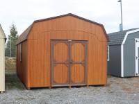 Pine Creek 12x24 HD Dutch with Rustic Cedar Polyurethane walls, Chestnut trim and Chesnut shutters, and Shakewood shingles